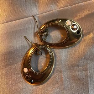 Large gold earrings with gemstones